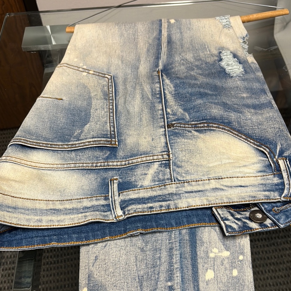 Distressed Blue Denim Jeans